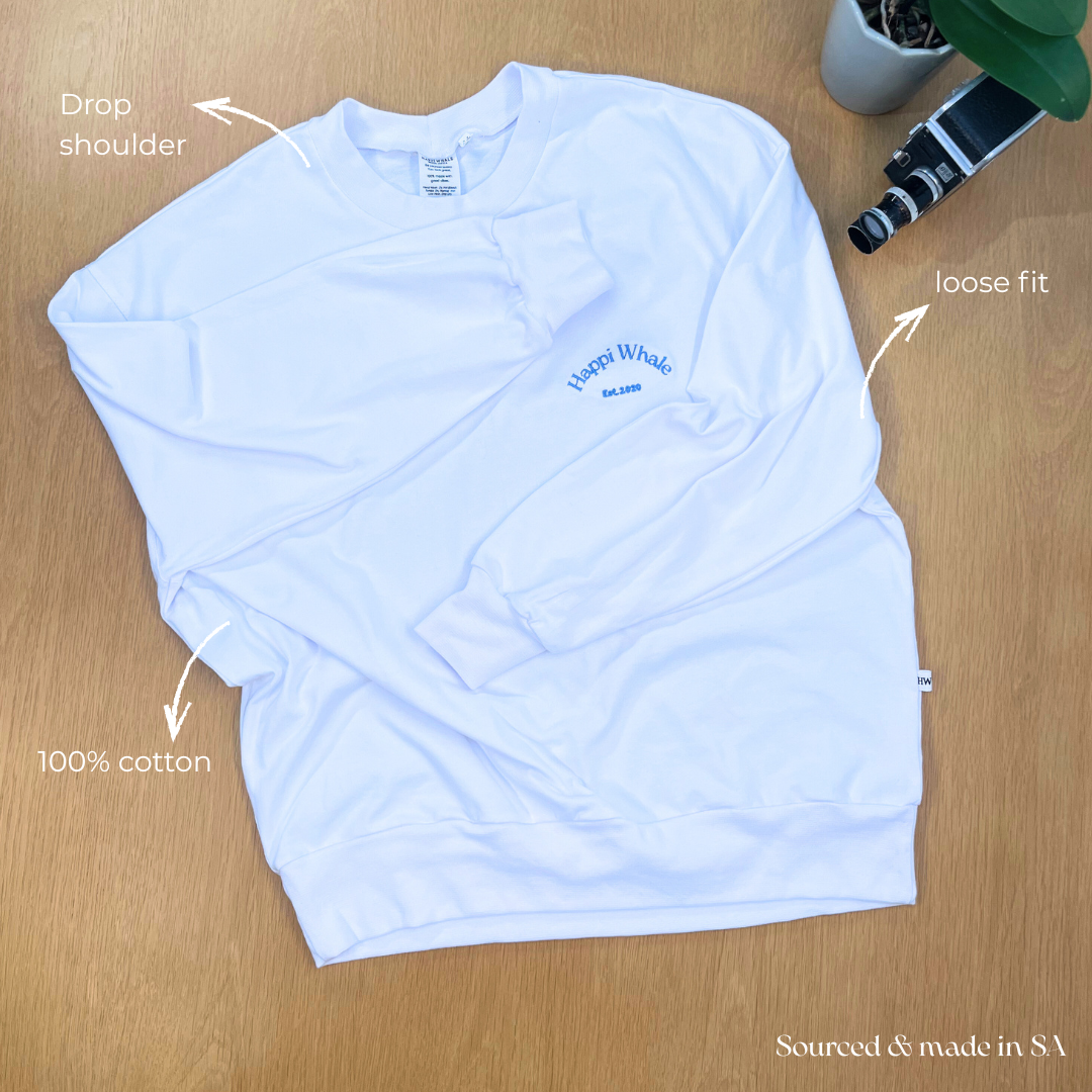 White Boyfriend Crew laid flat, labelled to show drop shoulders, loose fit and 100% cotton